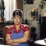 25-06-1999 Toen was geluk heel gewoon, Nel Kooiman at tv-studio in Aalsmeer.

[keywords]Posed, Eyecontact, Half Length, On Set[/keywords]